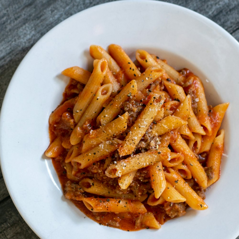 Penne in a tomato and meat sauce